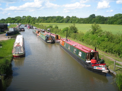Photo: Looking north from Turn Bridge (52), rally boats on right, main rally site on left.