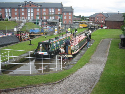 Photo: boats passing between the narrow locks