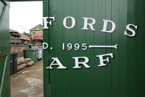 Photo: Entrance gate to the Dadford's Wharf boat yard.