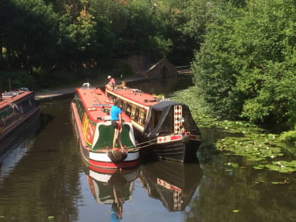 Photo: Harbourmaster assisiting with mooring attending boats.